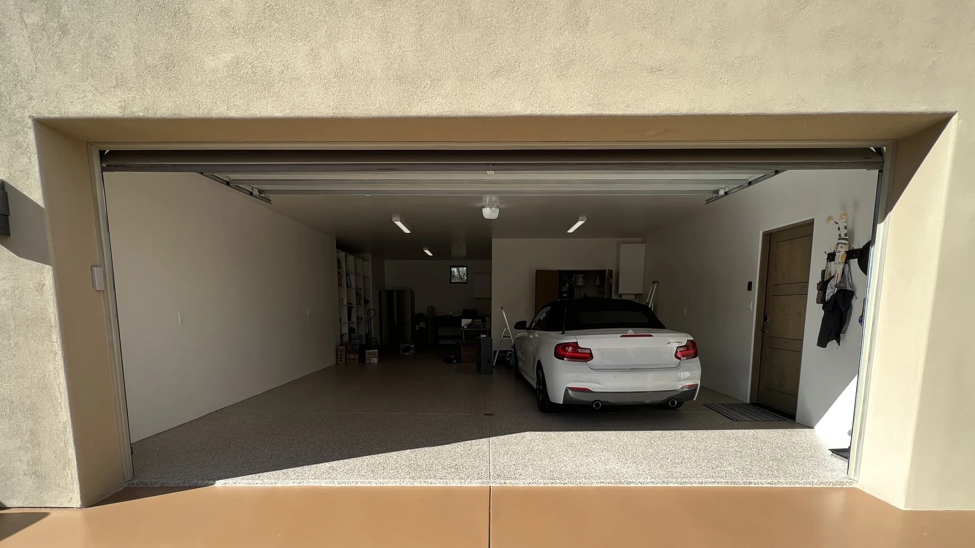 High-gloss epoxy flake garage floor coating in a Santa Fe, NM two-car garage, professionally installed by 505 Garage Floors